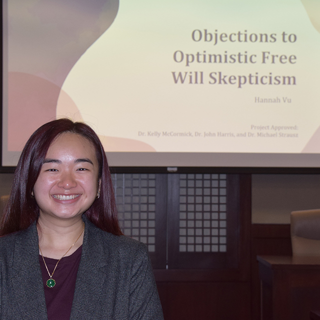 Student presenting Departmental Honors project